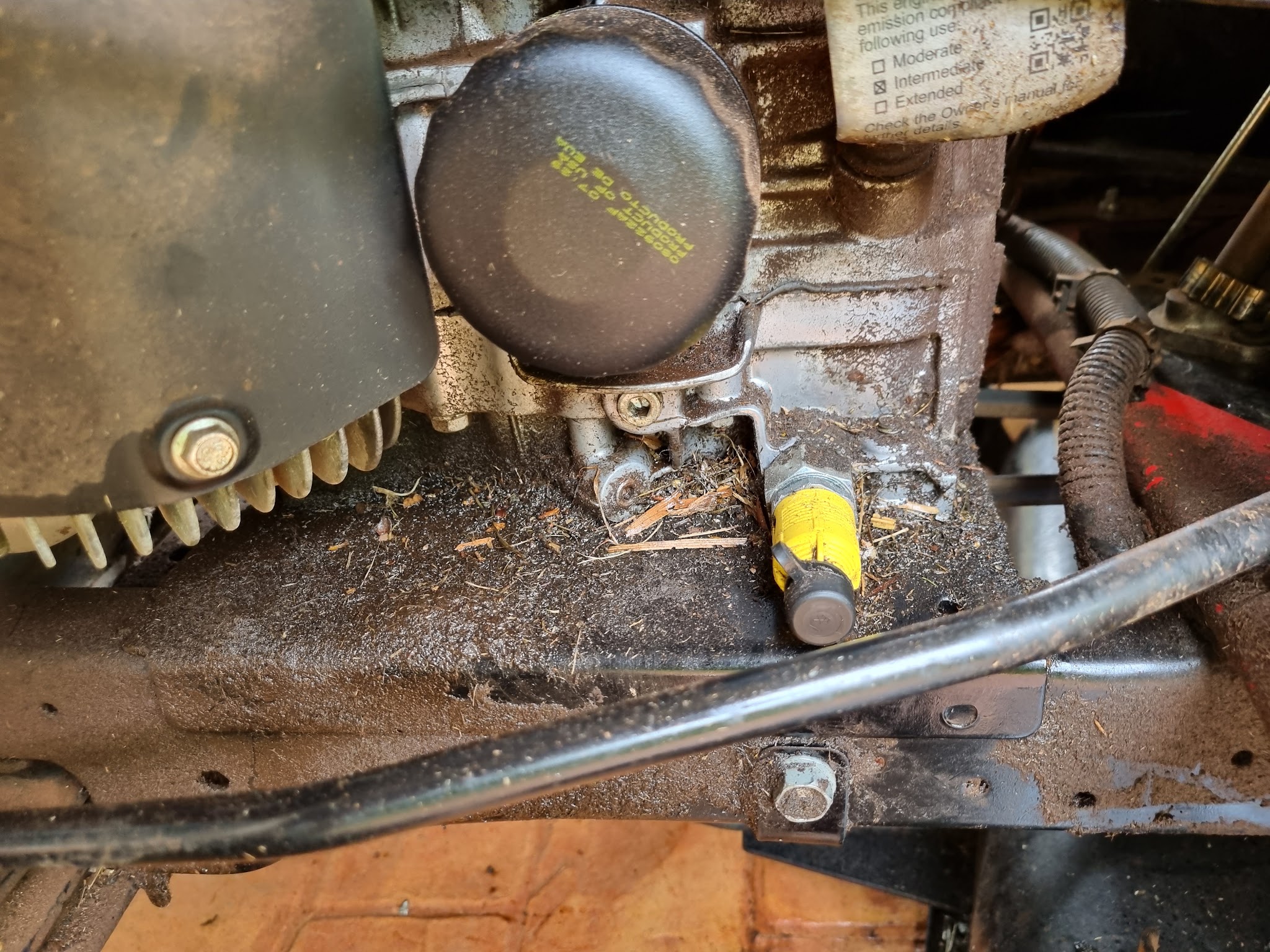 Close up of an engine bay being cleaned out during a service